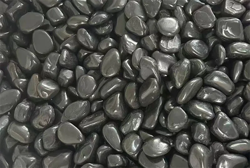 High Polished Black Pebbles used in outdoor landscaping projects