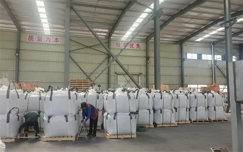 Large stock of snow white pebbles and landscape glass ready for shipment.
