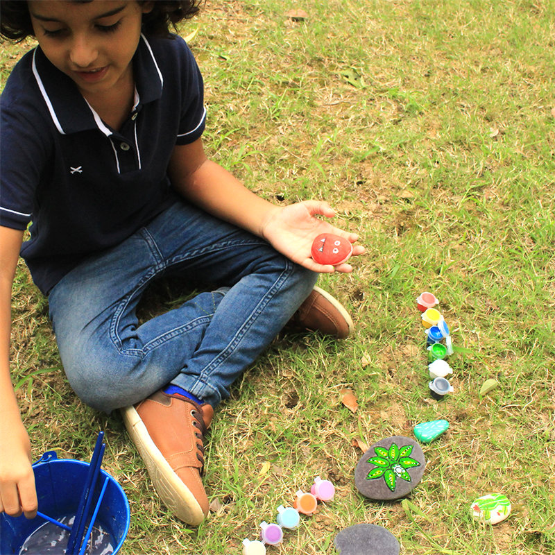 Natural painting rock with acrylic paint for children’s art activities