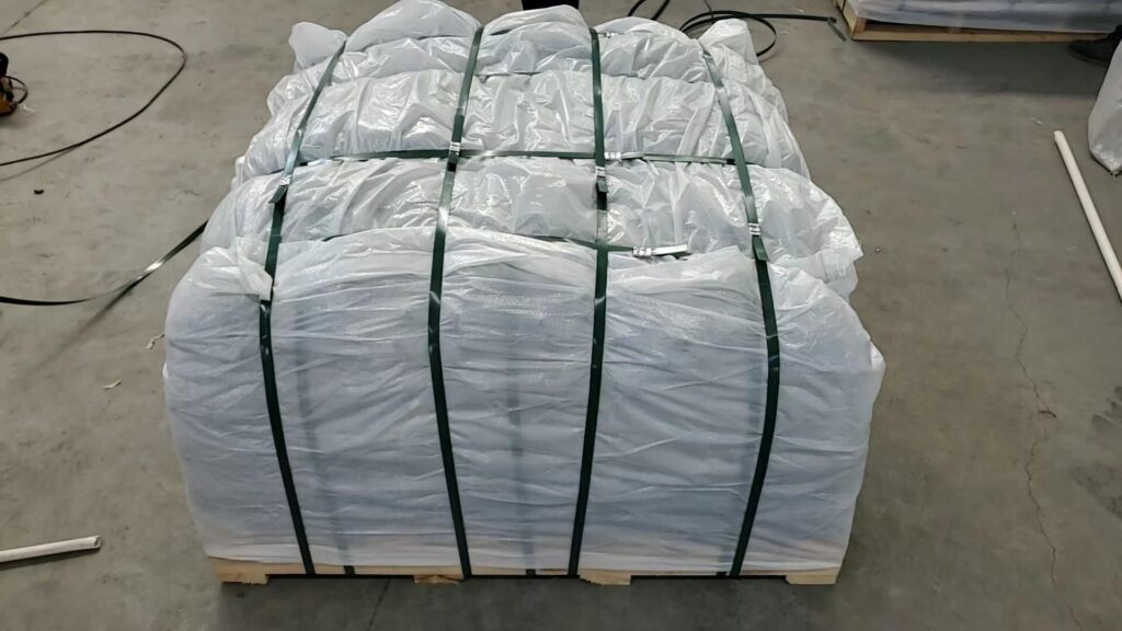 1 to 1.3 tons of landscaping pebble stones safely packed on heavy-duty fumigated solid wood pallets, secured for ocean freight.